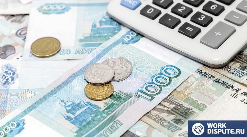 калькулятор лежит на купюрах